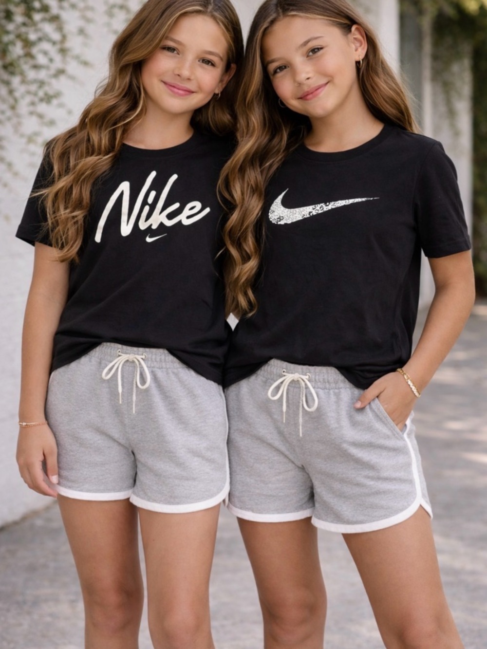 Nike Black Tee with White Swoosh and Speckled Accent kids Large